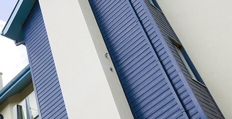 Blue uPVC cladding installation