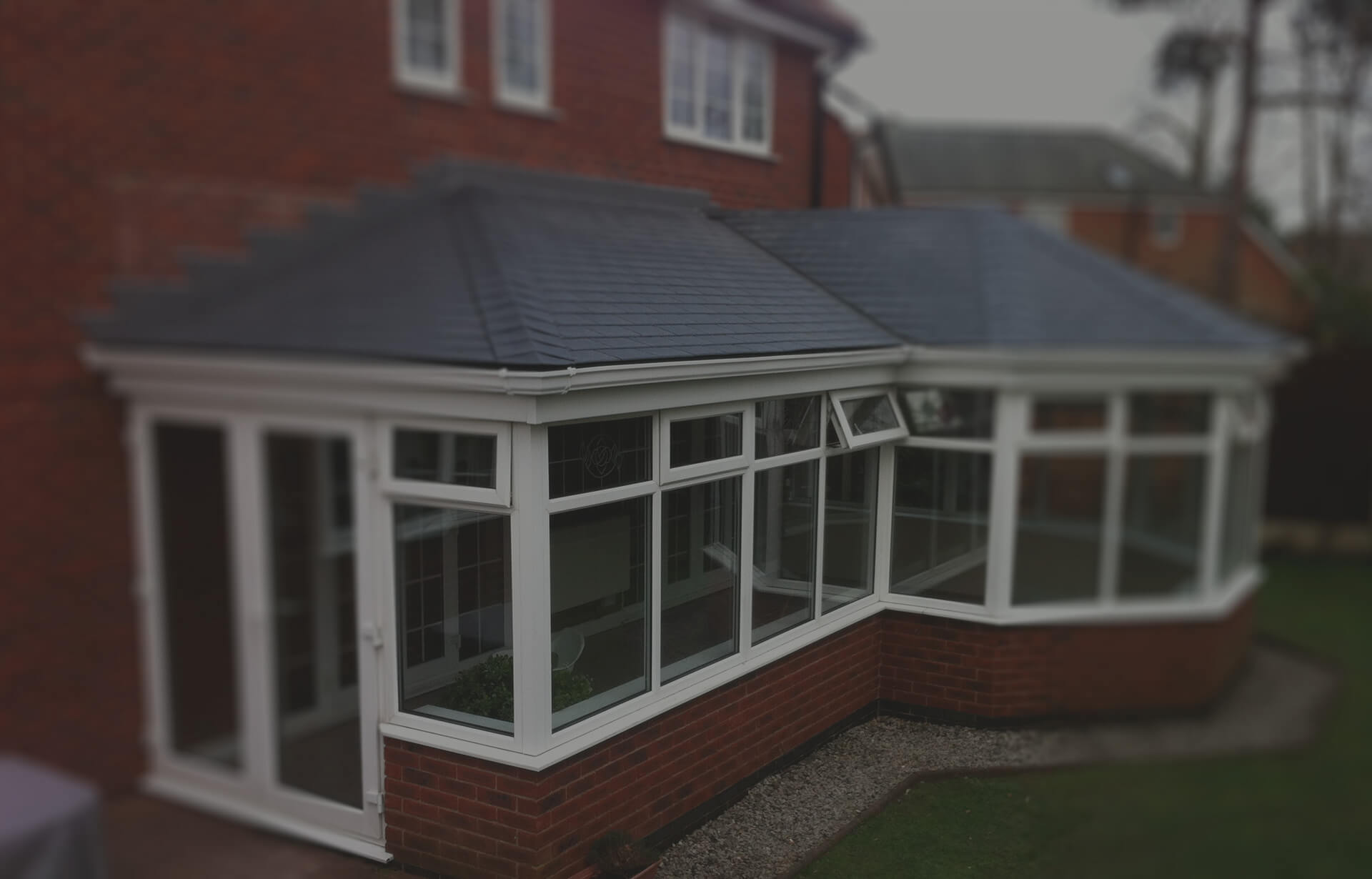 P Shaped conservatory with a tiled roof