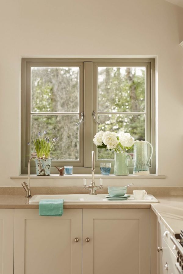 Bereco window interior in a cream coloured kitchen with window ornaments